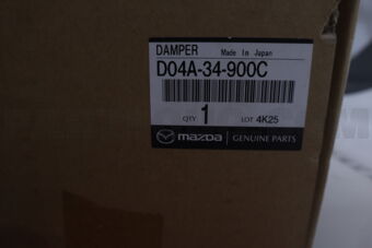Mazda D04A34900C DAMPER(L),FRONT